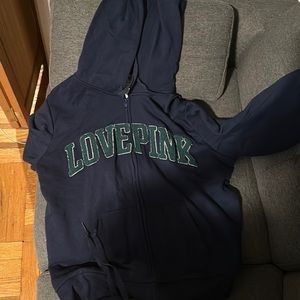 Brand new pink skinny jogger size lg never worn, still has tags on. Navy blue.